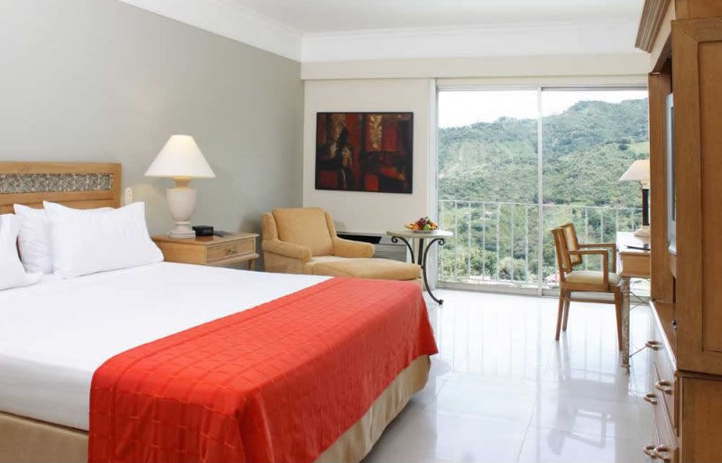 Hotel Estelar Altamira Ibagué Kültér fotó A room at the hotel